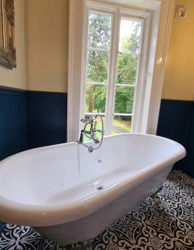 Bathroom wall and fixture finished with professional decorating services