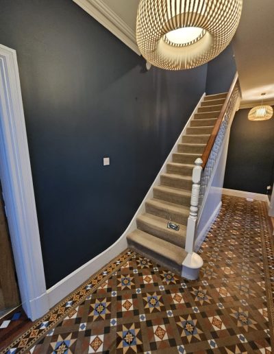 Professional staircase painting and decorating in a modern home interior